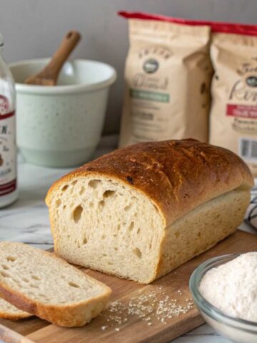 A gluten-free sourdough loaf with a dense